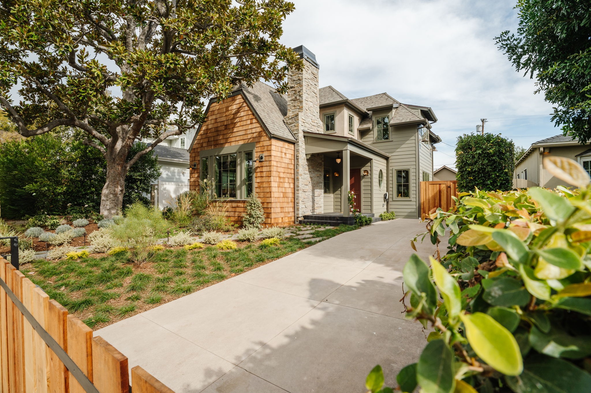 Farmdale front exterior and landscaped approach in actual listing photography